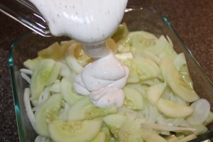 After slicing cucumbers and onions, mix the cream mixture in and refrigerate over night for the best flavor. 